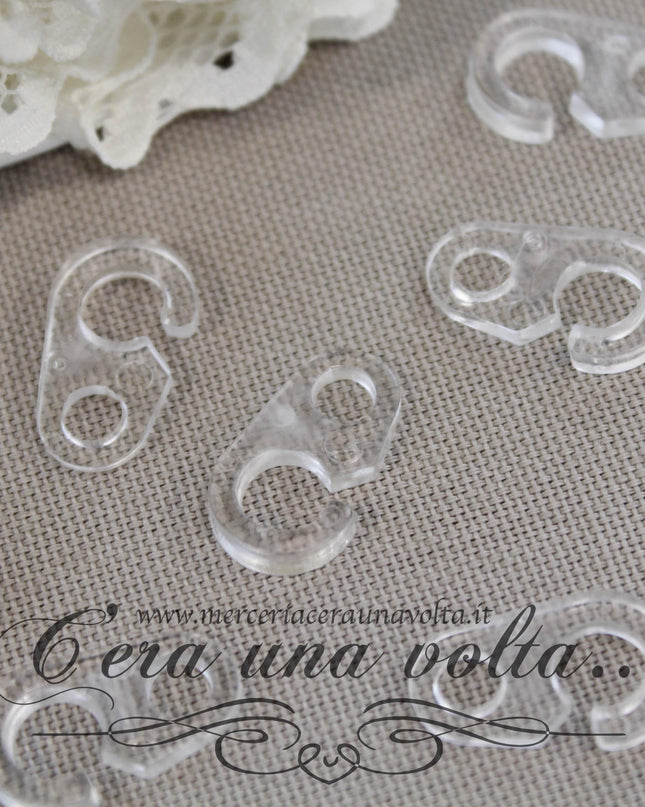 Gancio per tende