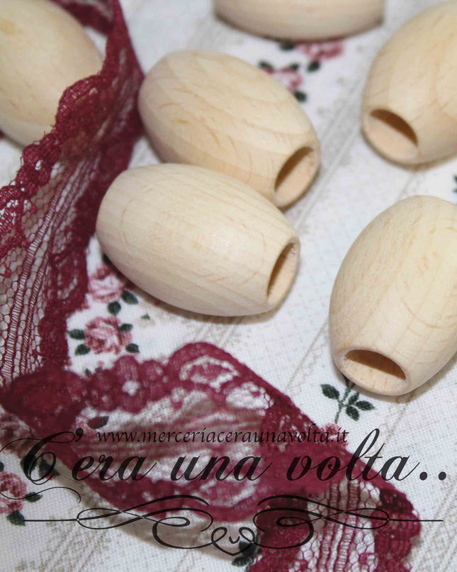 Perle ovali con foro grande in legno cm 3