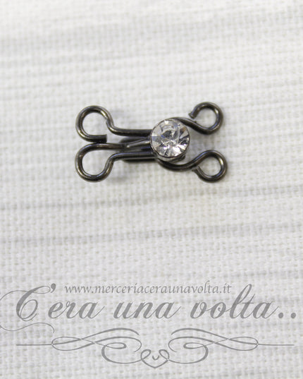 Ganci per abbigliamento con punto luce