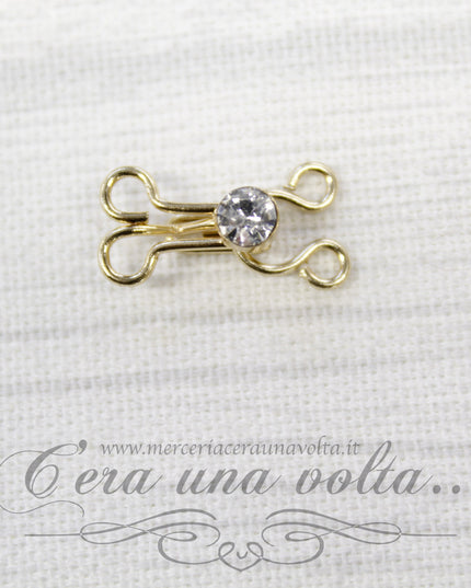 Ganci per abbigliamento oro con punto luce